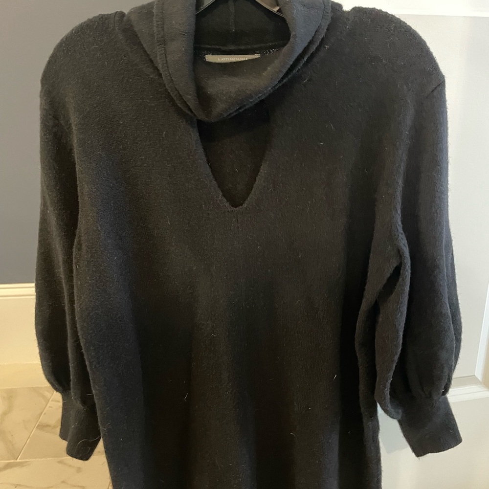 Anthropology sweater dress with cut out in center. Great looking with boots.